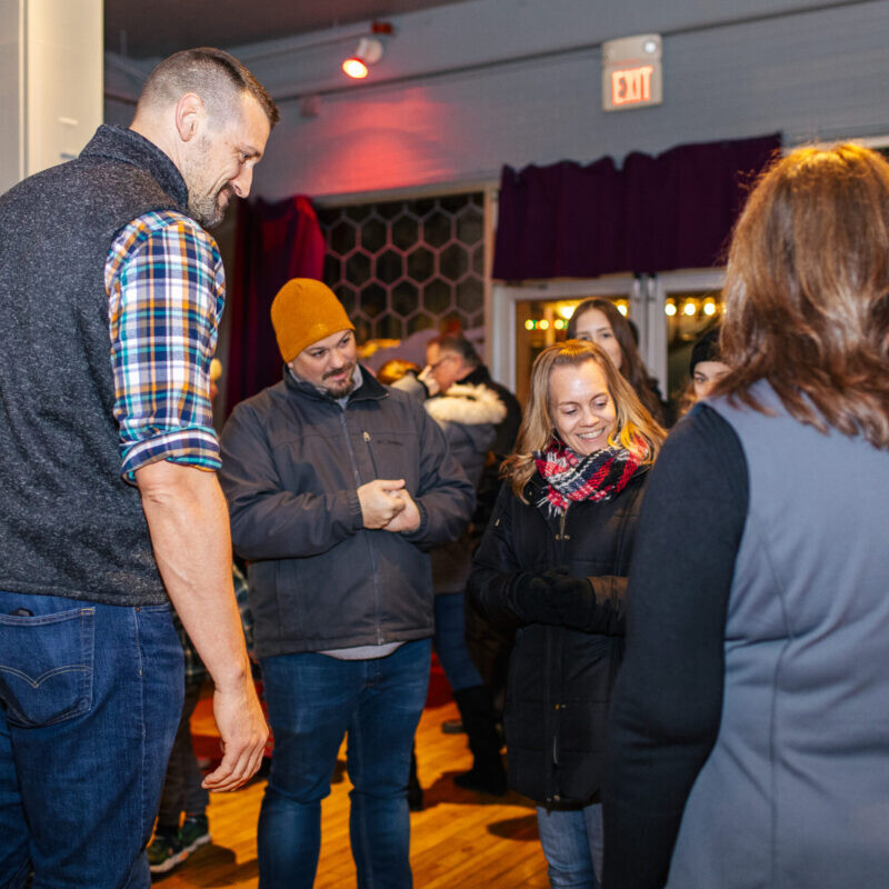 Seth Scott & his clients at Four Arrows Financial Group's Christmas Candylane Event